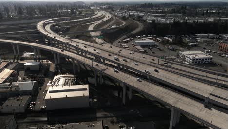 commuter traffic meanders through the nalley valley viaduct, tacoma wa, aerial ascend