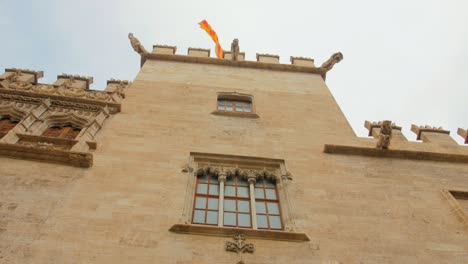 Lonja-de-la-Seda,-Silk-Exchange,-Valencian-Gothic-style-civil-building-in-Valencia,-Spain---low-angle-shot