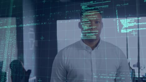 Animation of grid pattern and programming language over biracial businessman standing in office