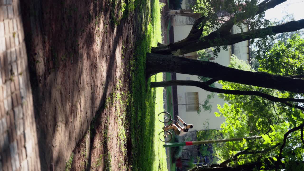 Young man ride a bike in the park