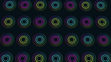 Dynamic-spiral-of-colorful-circles-on-black-background