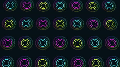 Dynamic spiral of colorful circles on black background