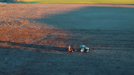 aerial view of tractor planting in field