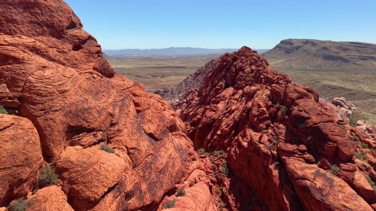 The camera soars out from between the rocks, capturing the spirit of adventure and discovery. A perfect clip for travel, exploration, or nature-themed projects