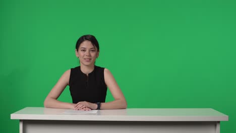 woman news anchor in studio