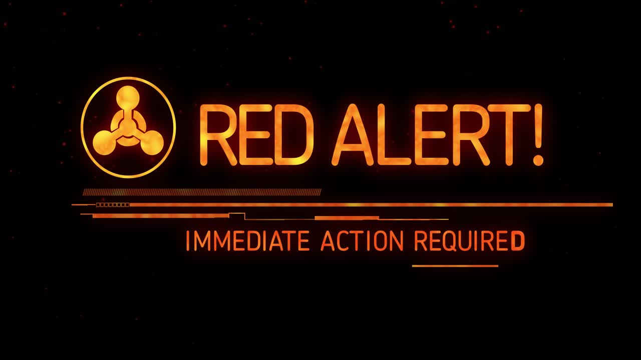 Red-particle star-field initiating emblem fading and text morphing into RED ALERT demanding action