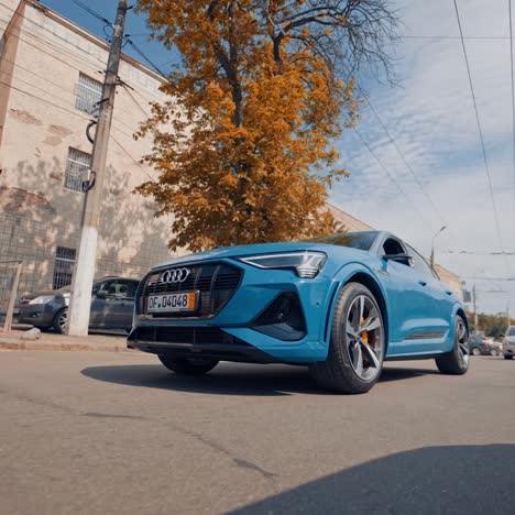 new space audi drives on city. audi overtakes everyone and shows its superiority