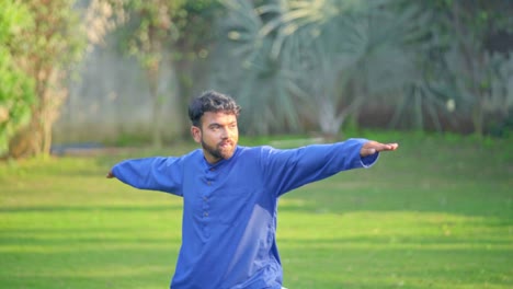 Indian-man-doing-Warrior-Yoga-Pose