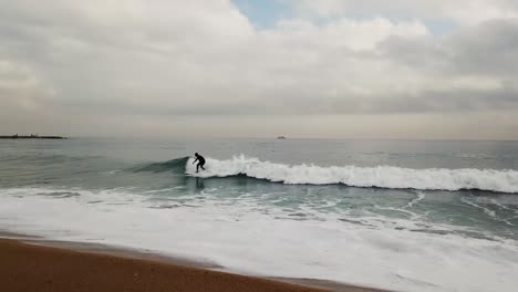 surfer ride on the wave in sea