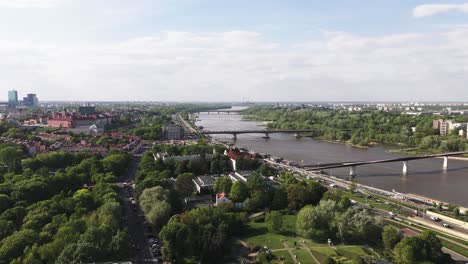fly sideways, view of vistula river, greenery, bridges and more, warsaw poland