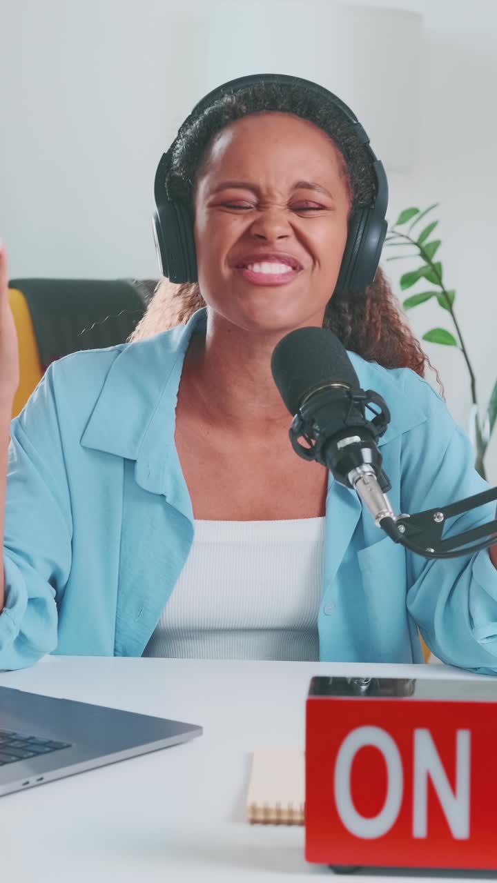 Engaging podcast recording session in a bright studio with a smiling host