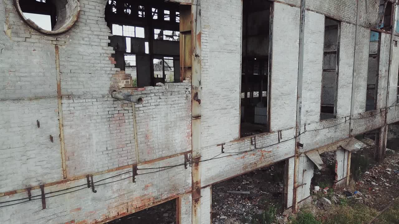 Aerial view of a destroyed factory during the war. Abandoned industrial building.