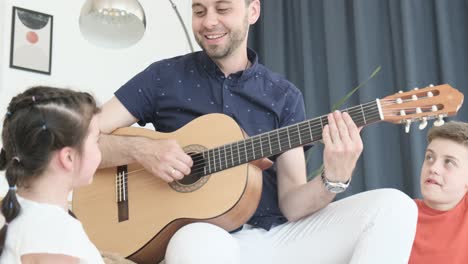 man plays acoustic guitar and sings a cheerful song. translation focus. outside the window the night. behind the back bokeh background. 12-string guitar.
1 clips in the pack.
shot with a canon 5mkii – 1920×1080, 25fps