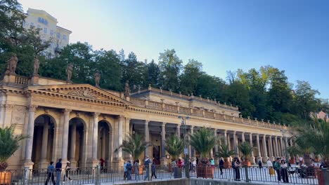 people walking along hot springs colonnade in karl 4k 2025 08 05 01 05 58 utc.mov | architectural, bathing, building, carlsbad