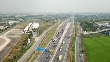 aerial footage of road transportation in asian suburban