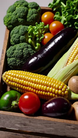 fresh vegetables in a wooden crate