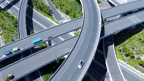 Drone-aerial-view-of-highway-overpass-bridge-with-cars-traffic-driving-over-infrastructure-roads-Alexandria-Mascot-airport-Sydney-Australia