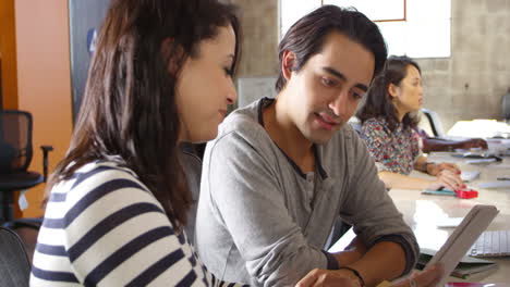 designers with digital tablet in modern office shot on r3d