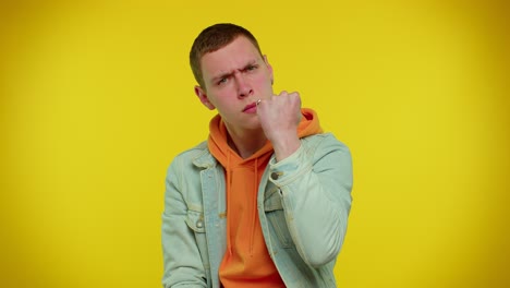 Aggressive-angry-man-trying-to-fight-at-camera,-shaking-fist,-boxing-with-expression,-punishment