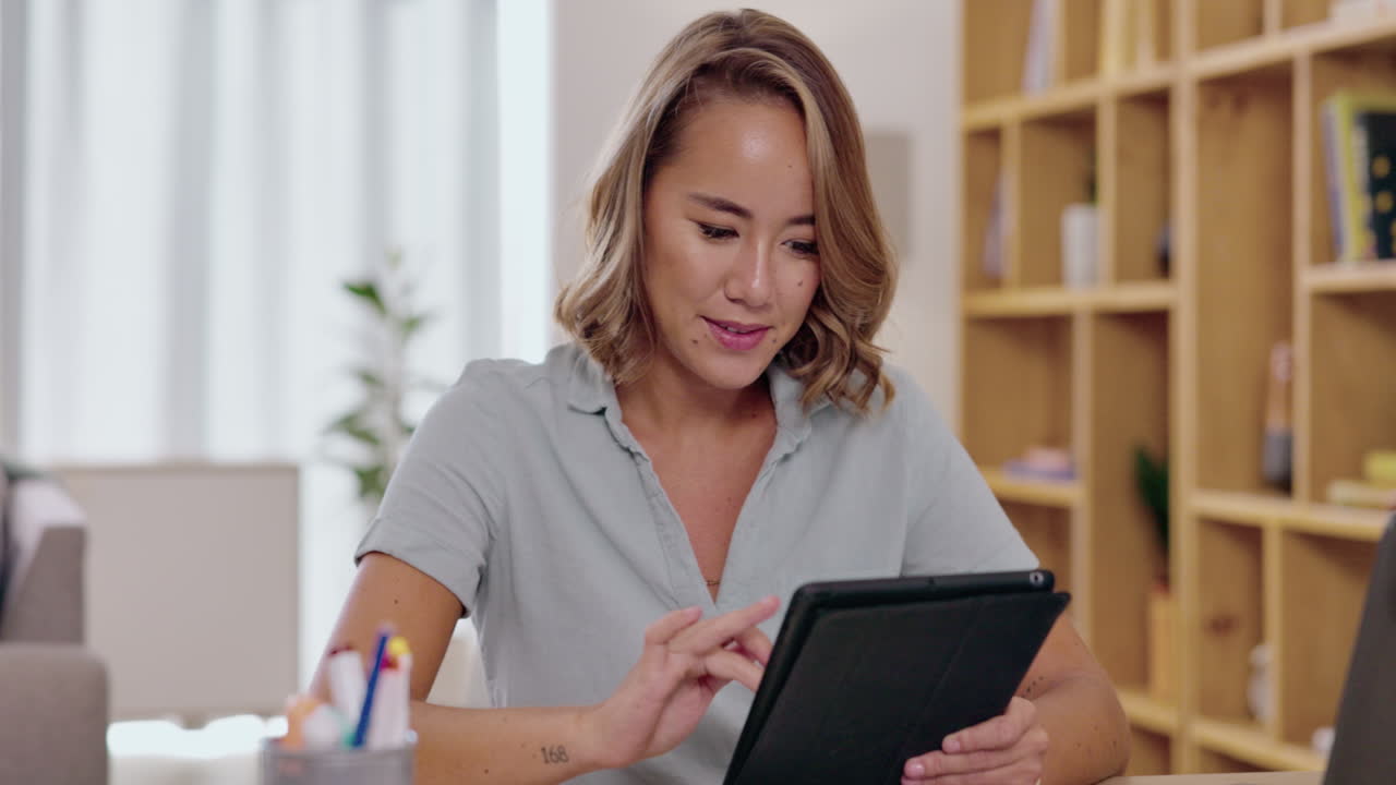 Happy, smile and tablet with woman in home office