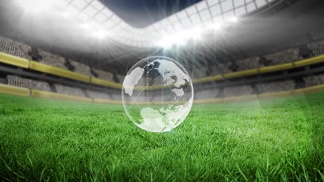Animation-of-globe-over-empty-stands-in-sports-stadium