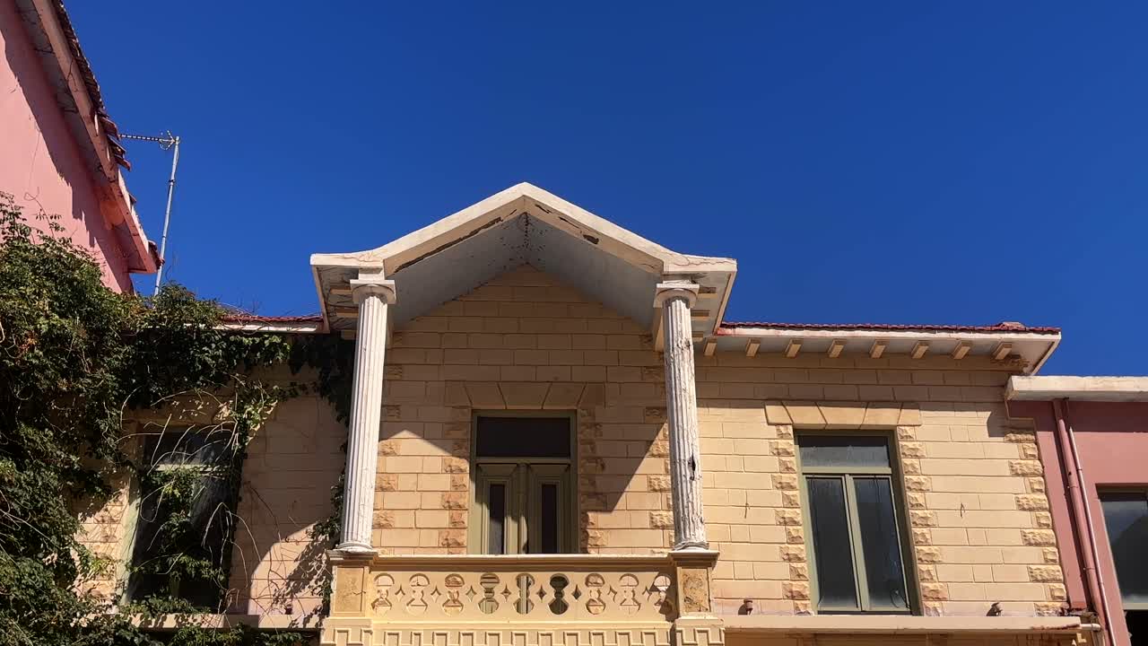 Architectural detail of an old house in Heraklion's Old Town Crete Greece under a clear blue sky