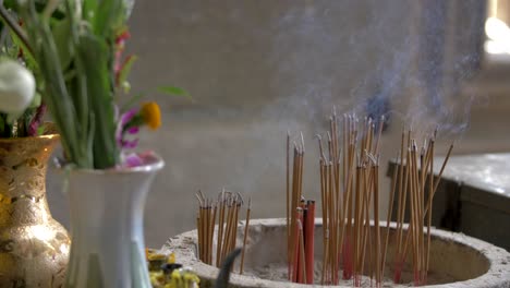 Incense-Burning-Angkor-Wat-Ruins-Spirit-Worship-Cinematic-Temple-Siem-Reap-Cambodia-4K