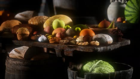 food table with wine barrels and some fruits, vegetables and bread