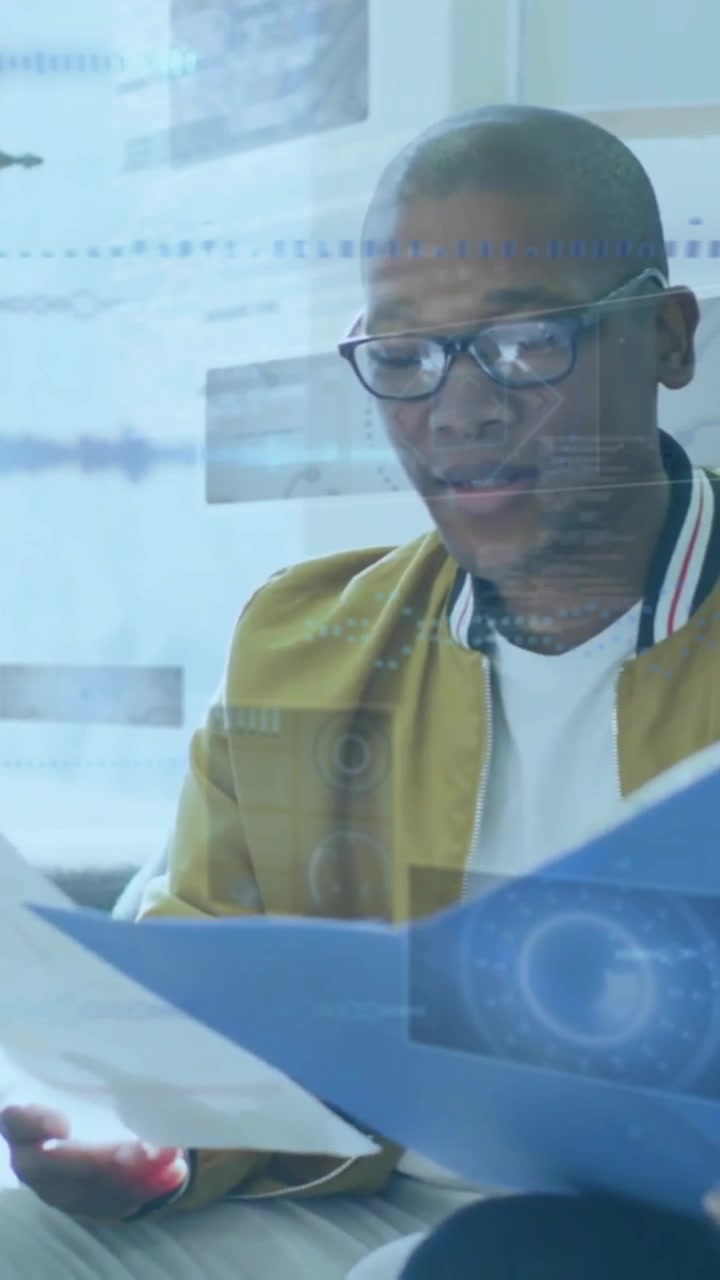 Animation of financial data processing over diverse business people in office