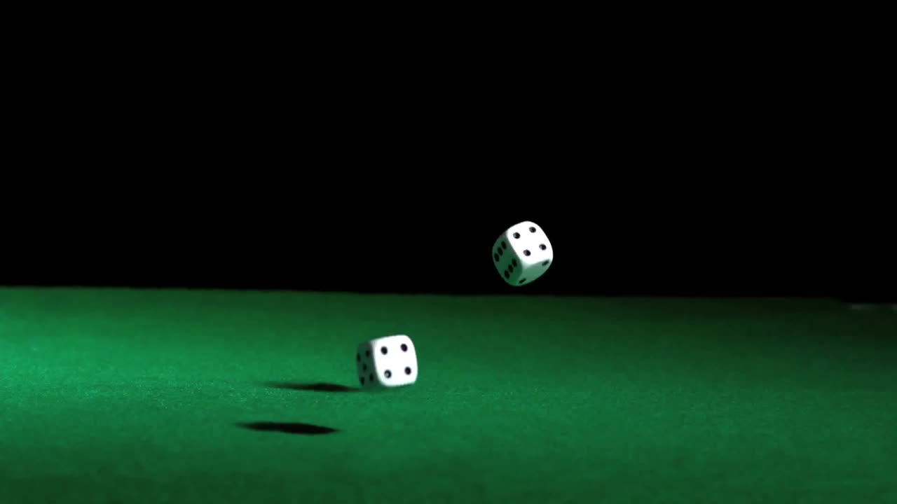 Animation of dices falling on black background