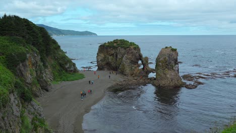 coastal landscape with rocks and people