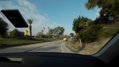 passenger side view taking an exit ramp onto the 101 to ventura in las angeles on a pretty day