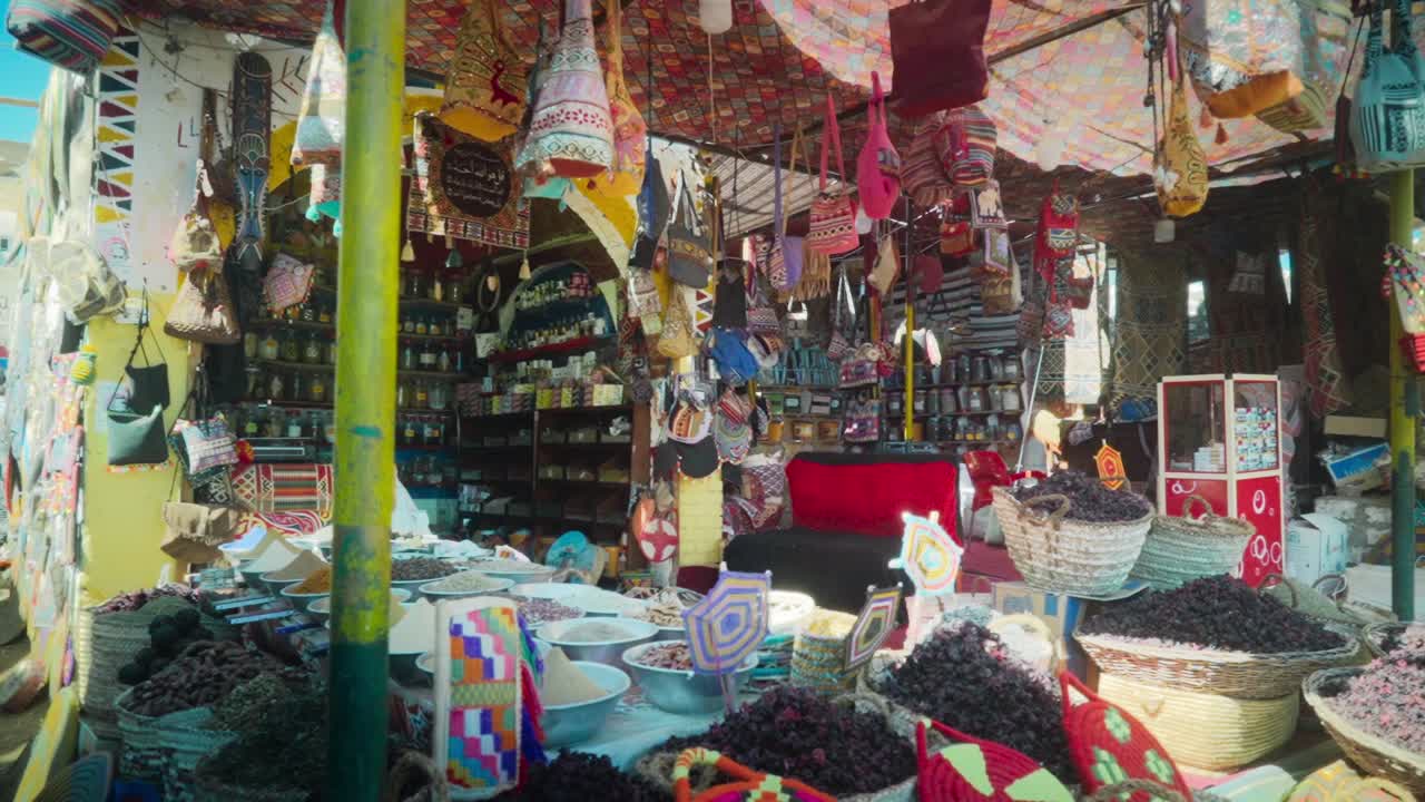 Traditional Egyptian spice and tea shop in a bazaar, Luxor Egypt. 
Slow rotational movement.