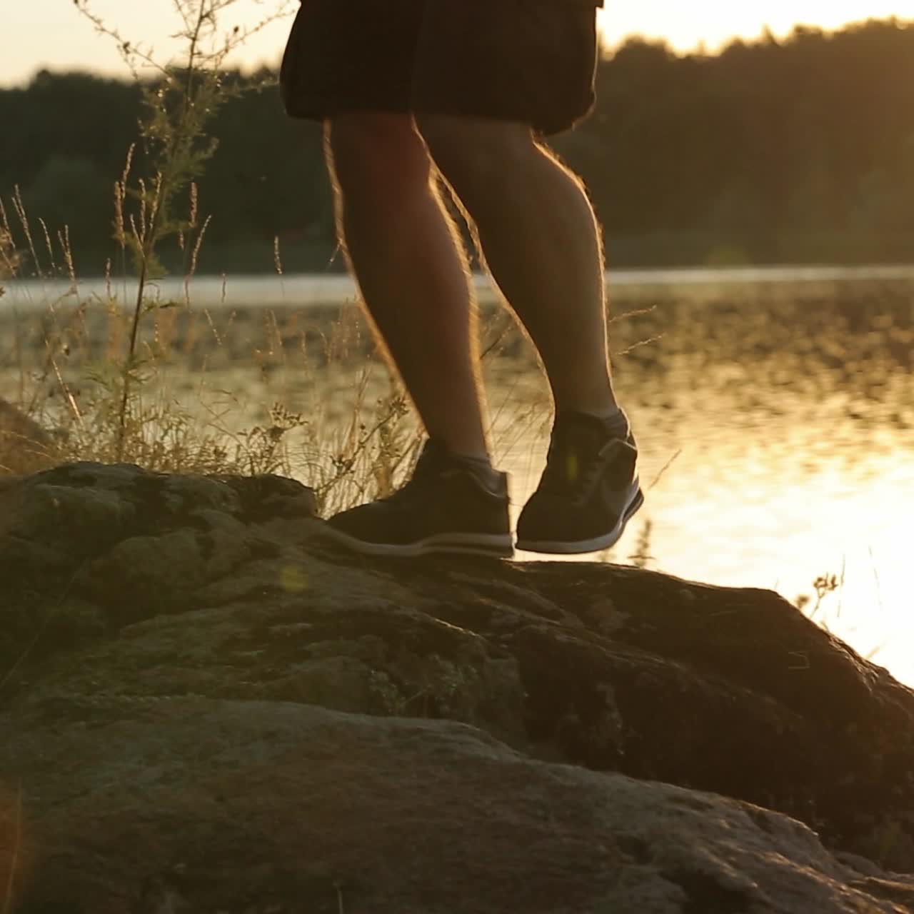 Hiker Rising On A Hill