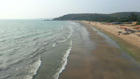 arambol goa beach drone shot ships boats on beach birds-eye view