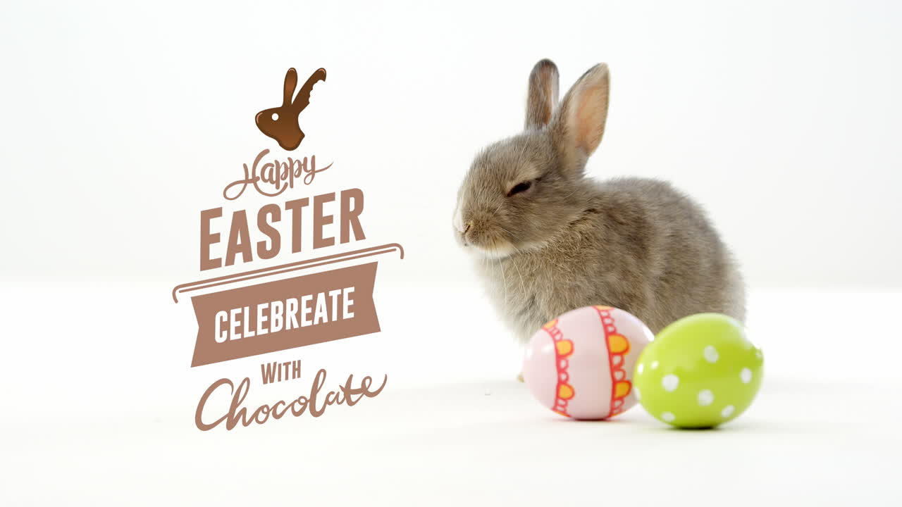 Animazione di uova di Pasqua con coniglio e testo 'Buona Pasqua'
