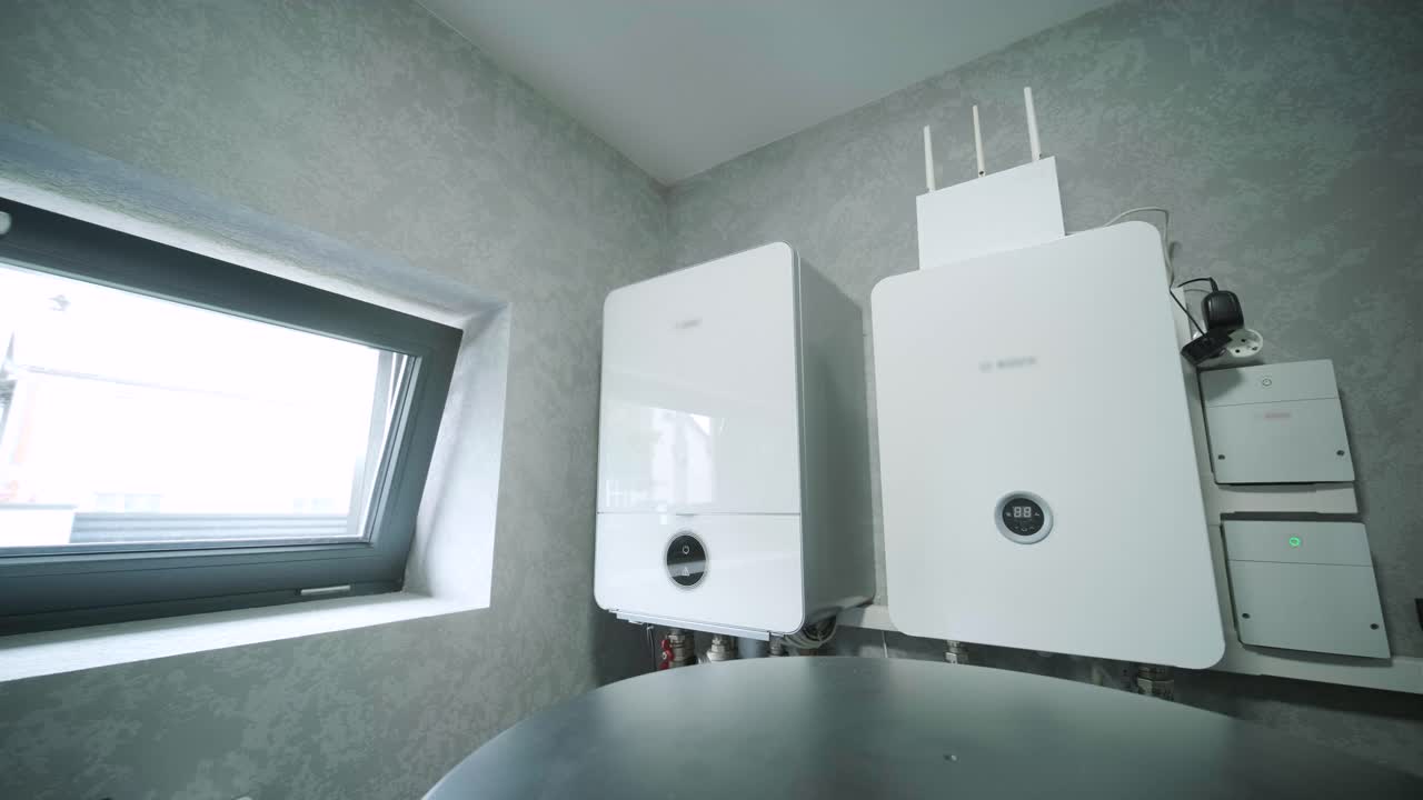 House boiler room interior with modern water heating system