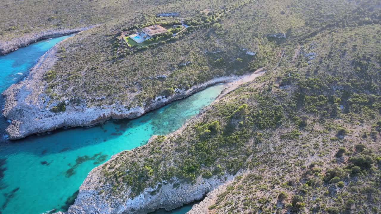 Experience the natural beauty of Cala Varques in Mallorca, featuring pristine turquoise waters and scenic coastal landscapes. A perfect spot for relaxation and adventure awaits.