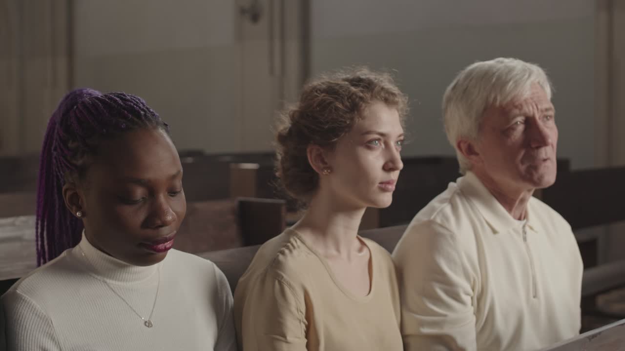 People Listening to Preaching in Catholic Church