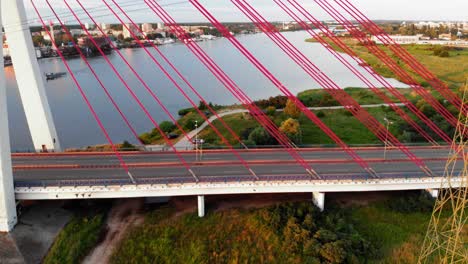 aerial shot of cable-stayed bridge on motława river in gdansk, poland