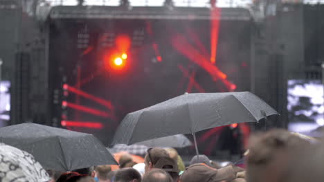 a slow motion of a rain at a concert show