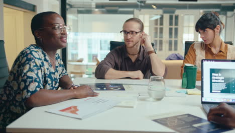 female business leader holding meeting with colleagues in the office