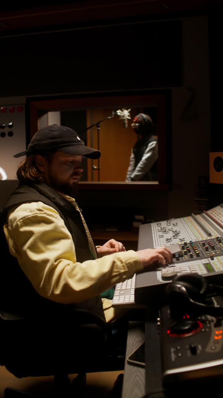 Music Engineer at Work in Studio