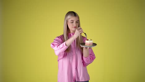woman enjoying a delicious cake