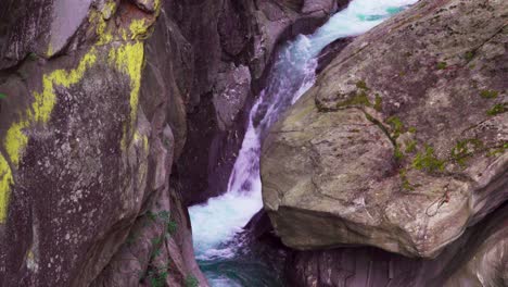 River-Passer-turns-into-a-small-waterfall-whilst-squeezing-through-a-narrow-part-of-the-Passer-Gorge-in-South-Tyrol,-Italy