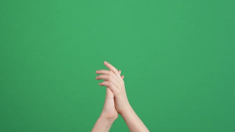 applause. kid clapping hands, applauding on green screen chrome key background. 4k video