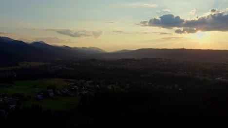 Aerial-Panoramic-View-Over-Zakopane-Village-With-Tatras-Mountains-At-Background-In-Southern-Poland