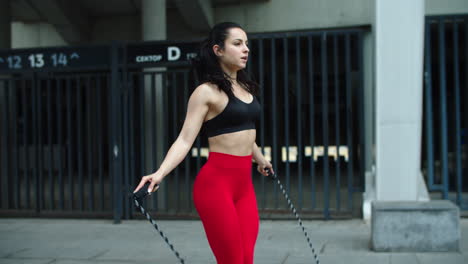 sport woman practicing jumping outdoor