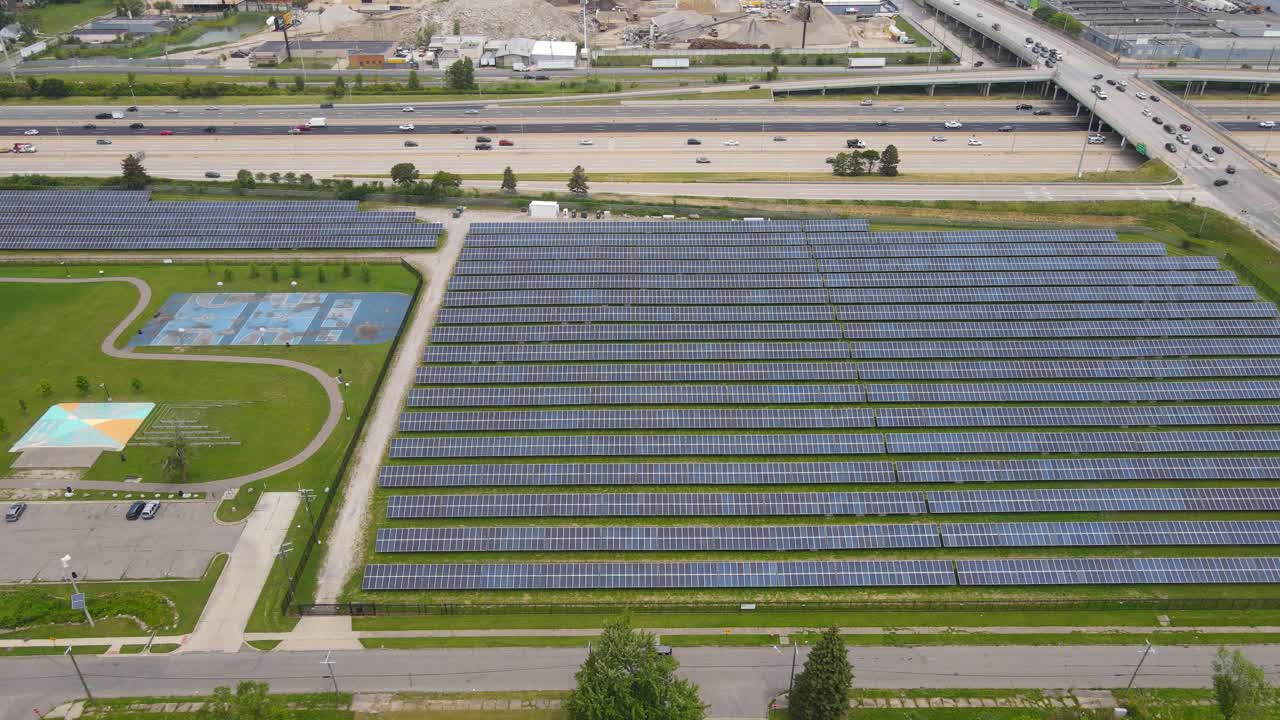 Expansive solar panel field next to O'Shea Playground and freeway in Detroit, Michigan