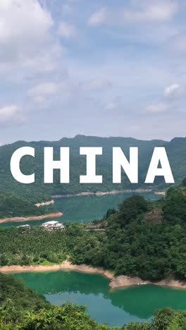 Vertical-Video-Time-Lapse-Shot-Of-Mountains-And-Coastline-In-China-With-Animated-Graphic-Spelling-Out-China-1